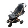 Belecoo Premium portable Baby Stroller in Dark Grey and Gold with reversible seat, suspension wheels and foldable design at Kids Kart Nepal.