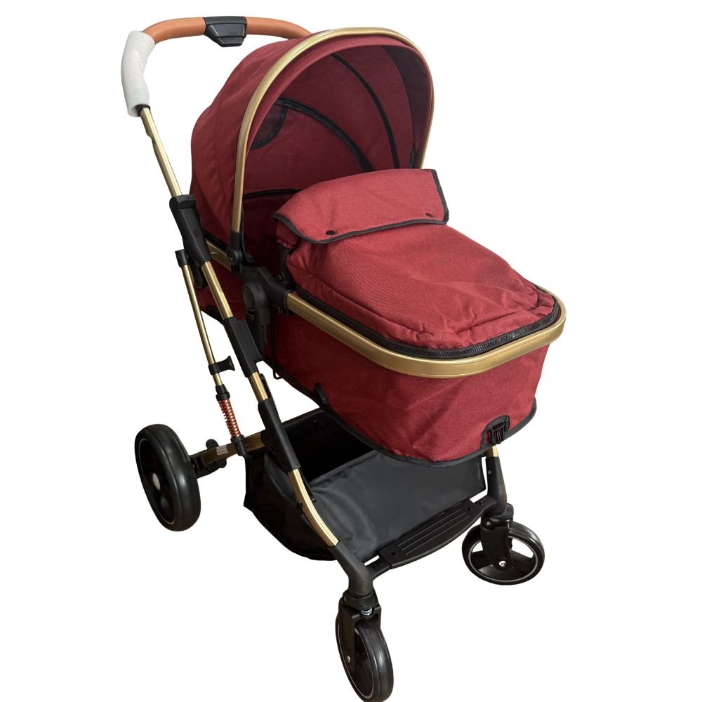 t988-premium-2-in-1-baby-stroller-red-gold-main T988 premium 2-in-1 baby stroller with carry cot in red fabric and gold aluminum frame, featuring a foldable design for newborns and toddlers.